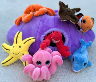 Encounter the magic of the underwater world! This 10-inch shell plush toy brings along eight other stuffed sea animal toys. They're crafted from super soft plush fabric and cozy PP cotton filling which makes them perfect for snuggling. They're more than just amusing plush toys. Kids will love using them to add a vibrant touch to their bedroom or playroom decor. It's both fun and decorative!