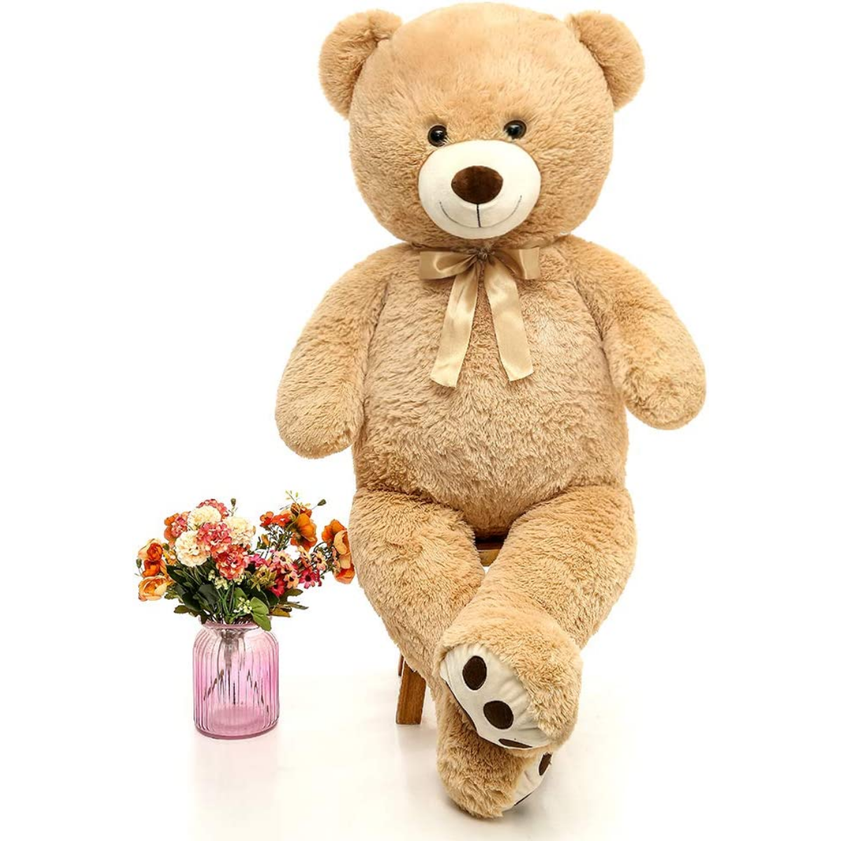 Adding a teddy bear can instantly up the cuteness factor and cozy feel in any room. Just look at this huge brown-colored teddy bear! It fits in easily with any decorative theme. Our teddy bear is packed with a soft and snuggly plushy material and filled with PP cotton. It's incredibly soft and perfect for cuddling with! Ideal present for your loved ones, be it family, friends, or the adorable little ones.